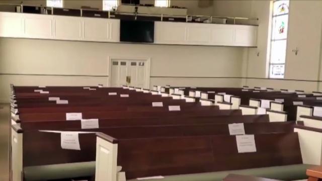 Hand sanitizer, blocked off pews to greet congregations as they return to church
