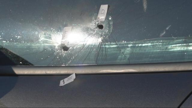 Bullet holes in car windows at apartment complex in Durham
