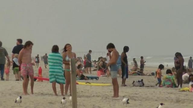 Memorial Day draws crowds to beaches, heats up debates about social distancing