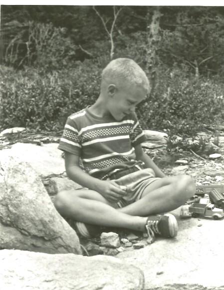 Bill Leslie playing as a child