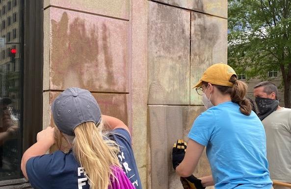 Volunteers clean up graffiti in downtown Raleigh