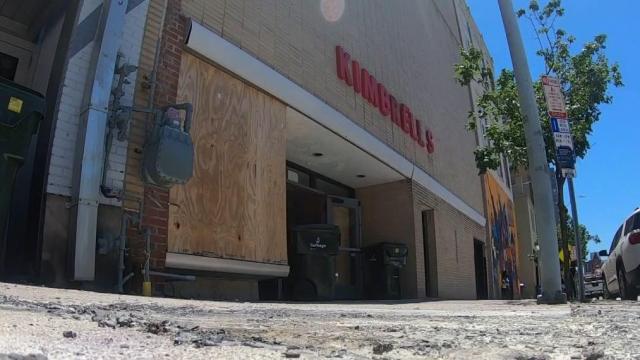 Riot damages 105-year-old local furniture shop in downtown Raleigh