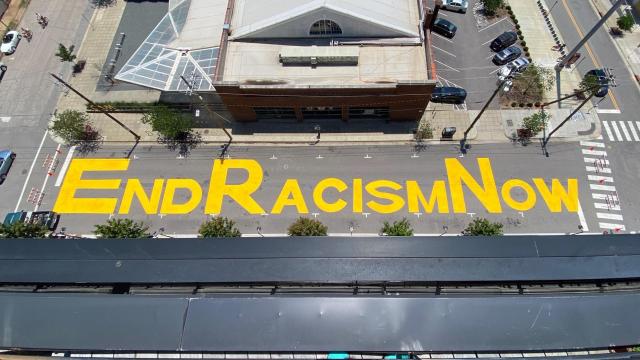 Protesters paint 'End Racism Now' in downtown Raleigh