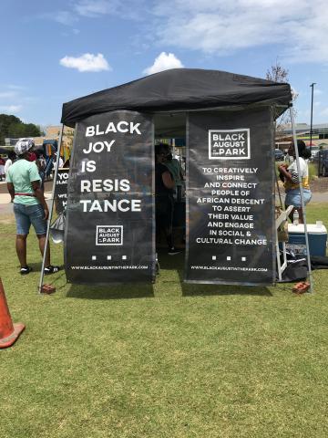 'Black joy is resistance' reads a sign at the Black Farmers' Market in Raleigh.