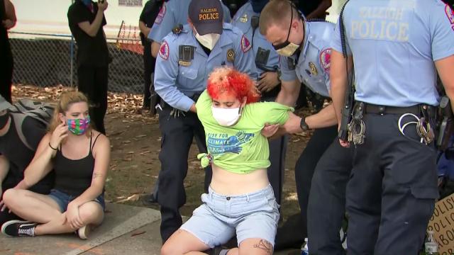 Police confront protesters near governor's mansion