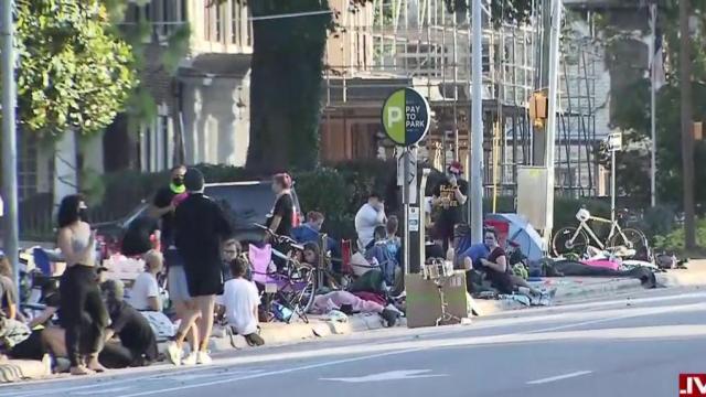 Protesters camp out for fifth day in a row outside governor's mansion