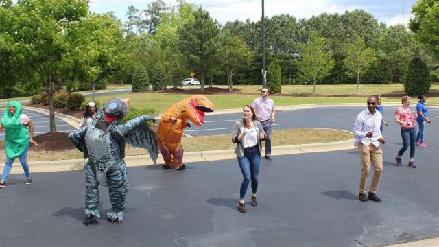 Apex mayor dancing with dinosaurs