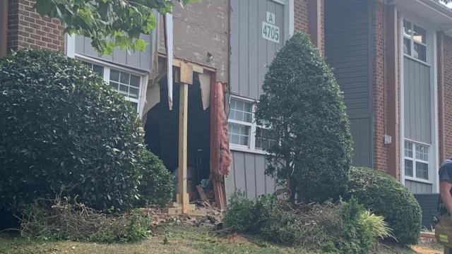 Van crashes through wall of Raleigh apartment