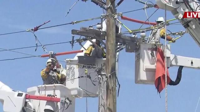 Powerline pole snaps in half as Isaias hits Emerald Isle, causing power outages