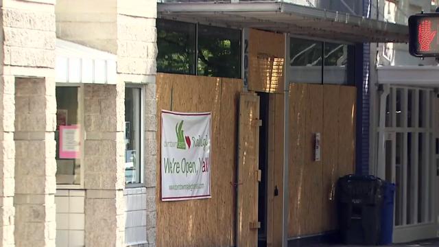 Dozens of downtown Raleigh storefronts still boarded up months after riots