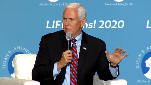 Pence joins abortion opponents at Raleigh women's clinic, church