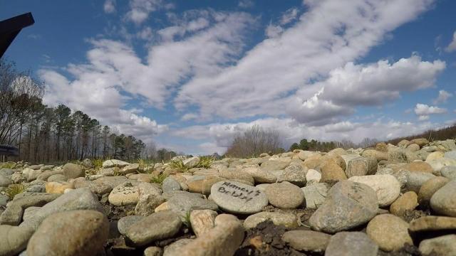 Popular overlook has messages from all over ... written on stones