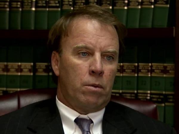 Lawyer pursues slander suit against attorney general