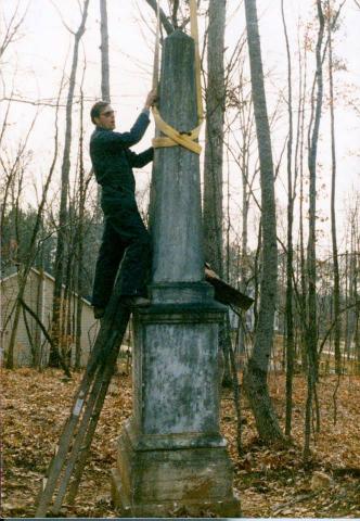 Trying to fix Nathaniel Jones' leaning obelisk.