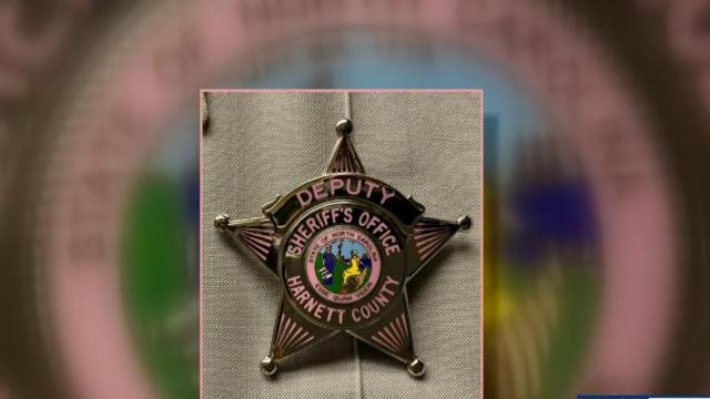 Harnett County deputies wearing pink badges for breast cancer awareness