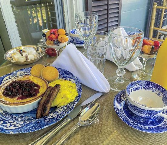 Southern style breakfast on the classic porch at Elmwood 1820 B&B