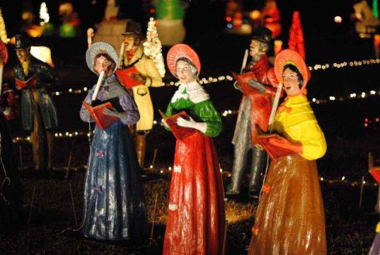These vintage carolers also belonged to the Cross family holiday display. There were restored by the Moore family, and now stand as part of Happyland.