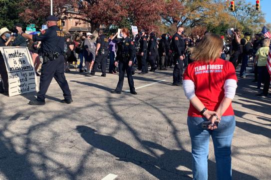 Raleigh police try to keep dueling protesters apart in downtown Raleigh