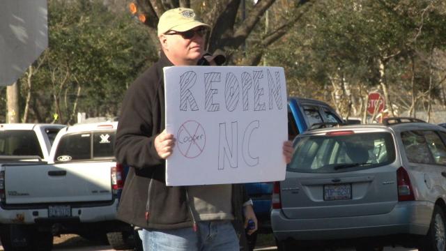 ReOpenNC supporters rally in support of Wendell General Store, against mask mandate