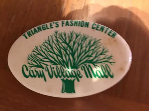 Logo of Cary Village Mall with the iconic oak tree Photo Credit: Amanda Benson