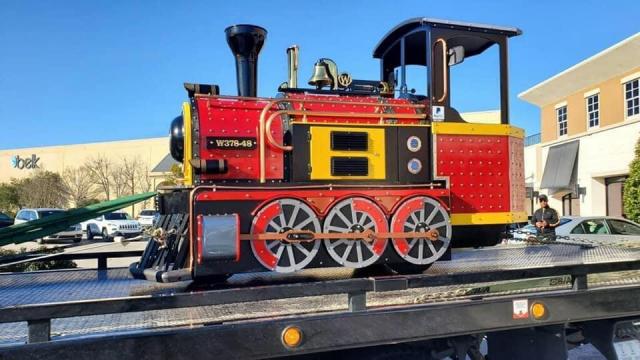 Cary Towne Center train takes final ride, towed away from the mall 