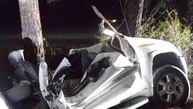 Car skids on black ice, crashes into tree in Raleigh