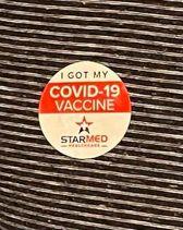COVID vaccine sticker from StarMed.