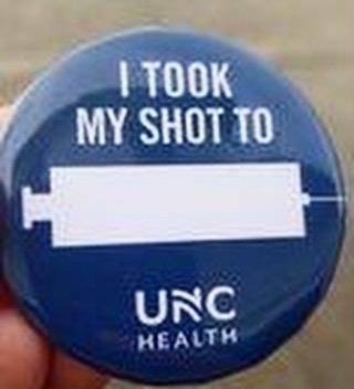 COVID vaccine button from UNC Health