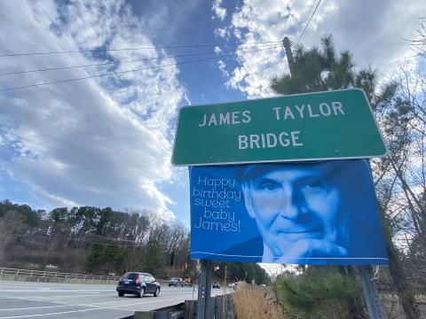 Happy Birthday banner on the James Taylor Bridge in Chapel Hill.