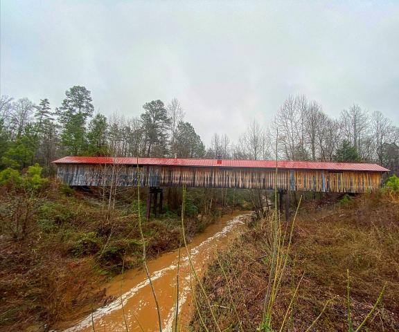 The longest covered bridge in North Carolina stretches 140 feet long. It's part of the Ole Gilliam Mill Park in Sanford. 