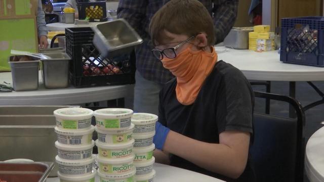 10-year-old chef sharpens skills at food bank