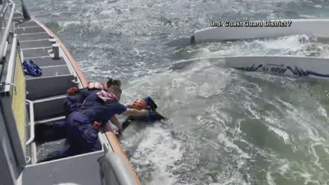 Dramatic Coast Guard rescue caught on camera after man's boat capsizes