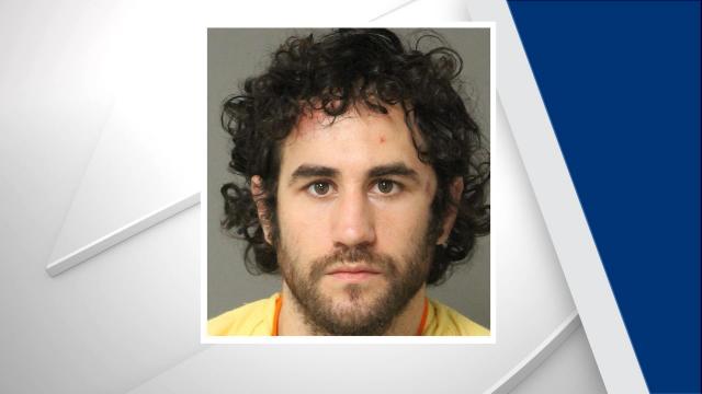 Man accused of wielding chainsaw at Raleigh hotels charged with assaulting detention officer