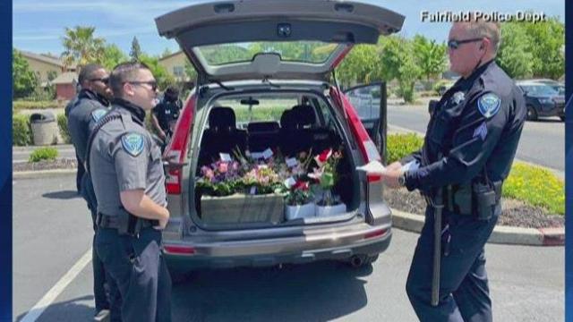 Cops deliver flowers for Mother's Day after delivery driver gets DUI