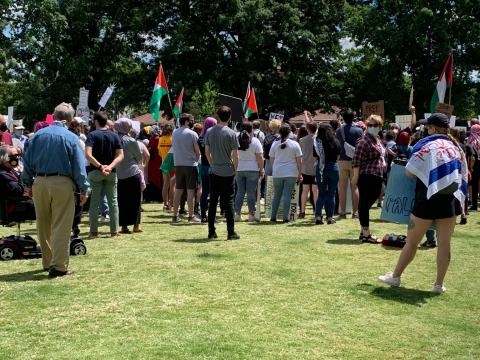 Over 100 protesters gathered in Moore Square and marched in Raleigh after an Israeli strike that flattened a Gaza building and another that led to the deaths of at least 10 people, including children.
