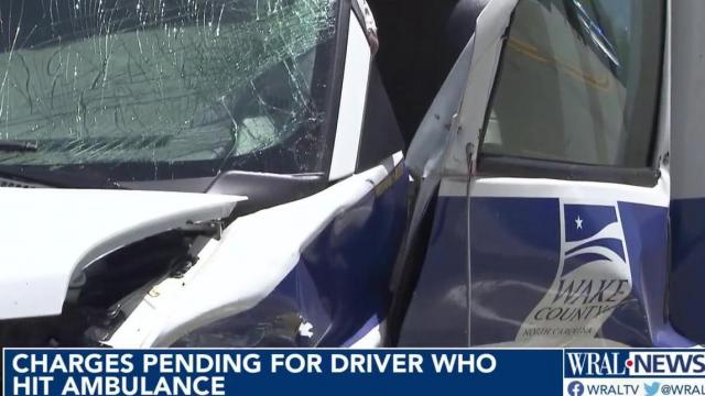 Charges coming for driver who hit ambulance