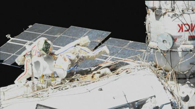 Russians conduct spacewalk on ISS ahead of new module