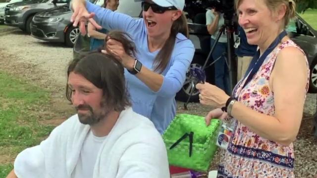 Students cut Cary teacher's hair after months of pleading with him to let it grow