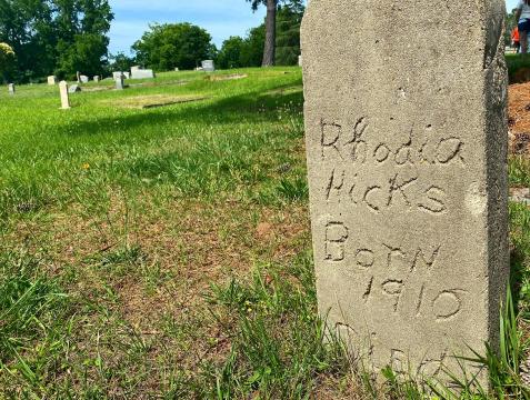 A crowd of around 50 people gathered for a walking tour of the rolling green hills of Mt. Hope Cemetery, one of Raleigh's earliest municipal African American cemeteries. 
