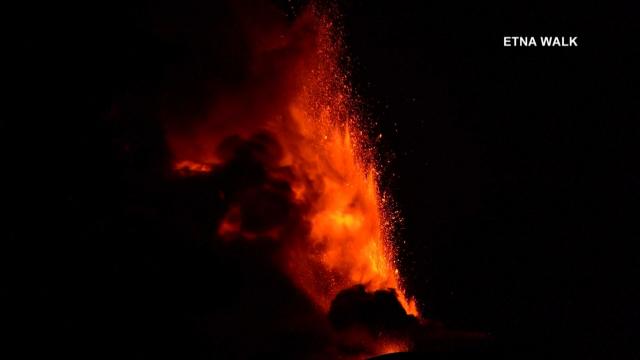 Bright red lava shoots into sky as Italy's Mount Etna erupts