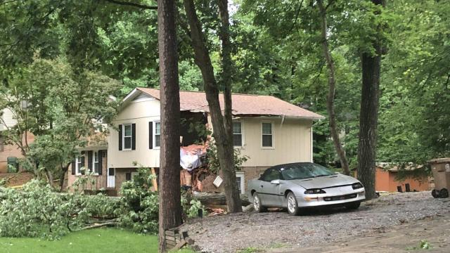Tree falls on Cary home; rest of tree then falls on neighbor's home hours later 
