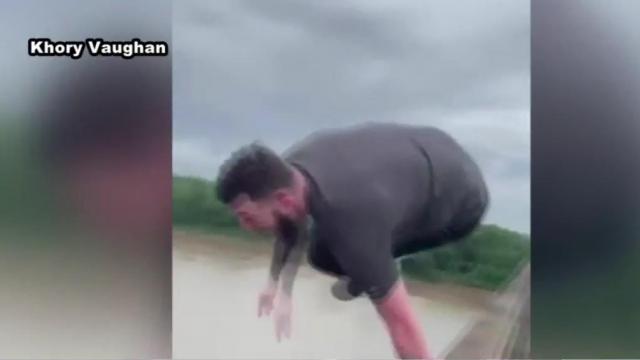 Man stuck in traffic jumps off bridge, prompting water rescue