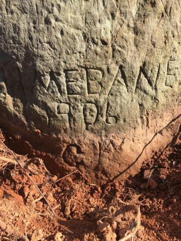 Stagecoach Rock has names carved near the base as well, possibly indicating more names hidden beneath the ground. (Photo courtesy of Gary Clark)