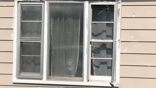 Raw: Bullet holes visible in Durham home where woman was shot
