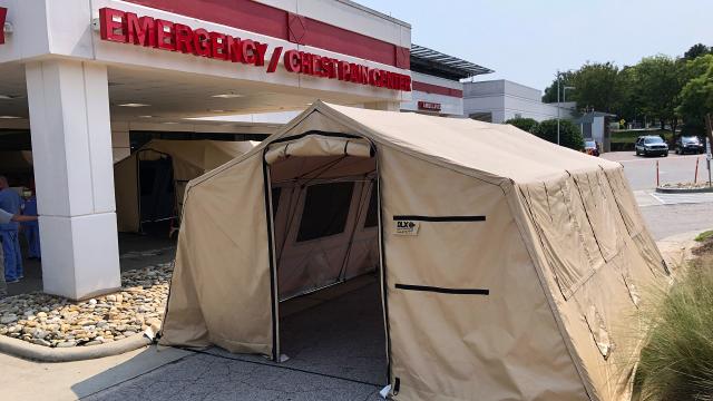 Tents go up outside Rex Hospital for second time during pandemic
