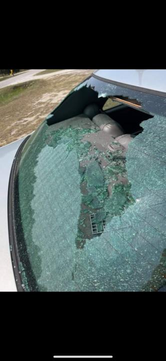 Several shots were fired into the back of a car while a mother and her 9-year-old daughter were driving in Pembroke. Four people are facing charges