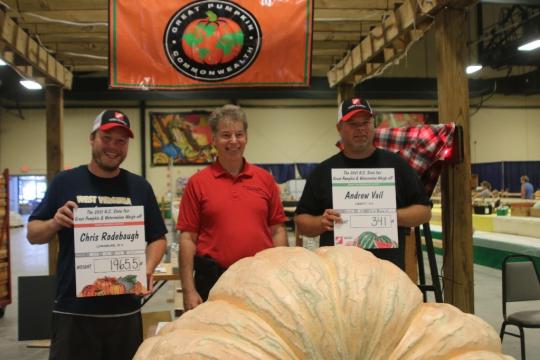 Chris Rodebaugh of Lewisburg, WV set a site record with a 1,965.5-pound pumpkin. Chris Rodebaugh of Lewisburg, WV set a site record with a 1,965.5-pound pumpkin. Andrew Vial of Liberty also set a site record for his 341-pound watermelon. (Photo from the N.C. State Fair). 