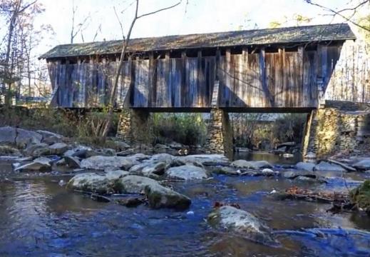 Pisgah covered bridge was built in 1910, but was washed away in 2003 and rebuilt. It's one of NC's oldest remaining covered bridges.