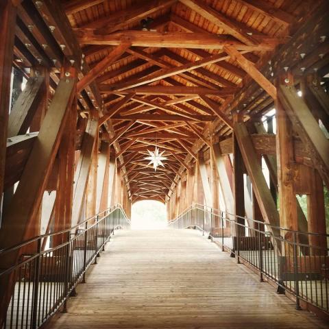 It may look historic and serve as the entryway to historic Old Salem, but the Old Salem covered bridge was built in 1998. The beautiful structure is built near the site of NC's first Moravian community.