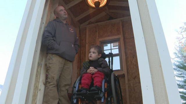 High schoolers build 'school bus hut' for disabled student